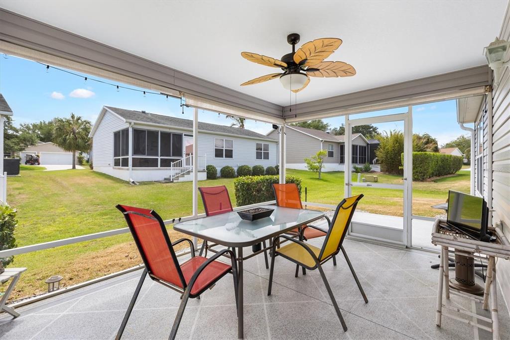 470 Oboe Way The Villages, FL 32162 - Photo 23 of 42 a view of a dining room with furniture window and outside view