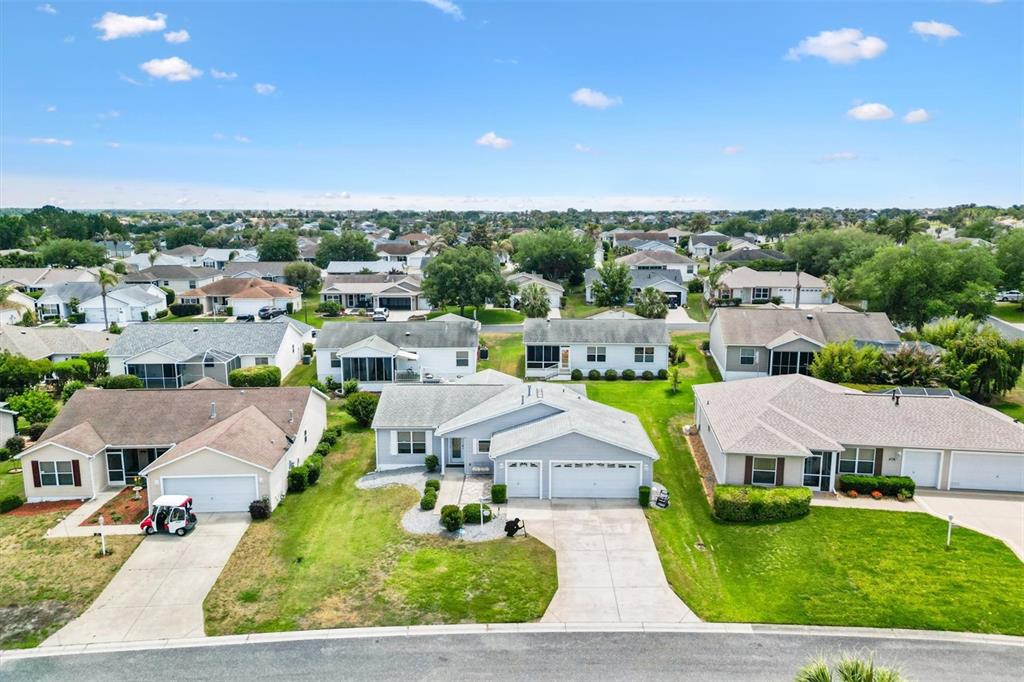 470 Oboe Way The Villages, FL 32162 - Photo 25 of 42 an aerial view of residential houses with outdoor space