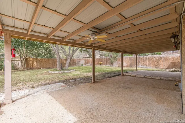a view of a big room with large windows