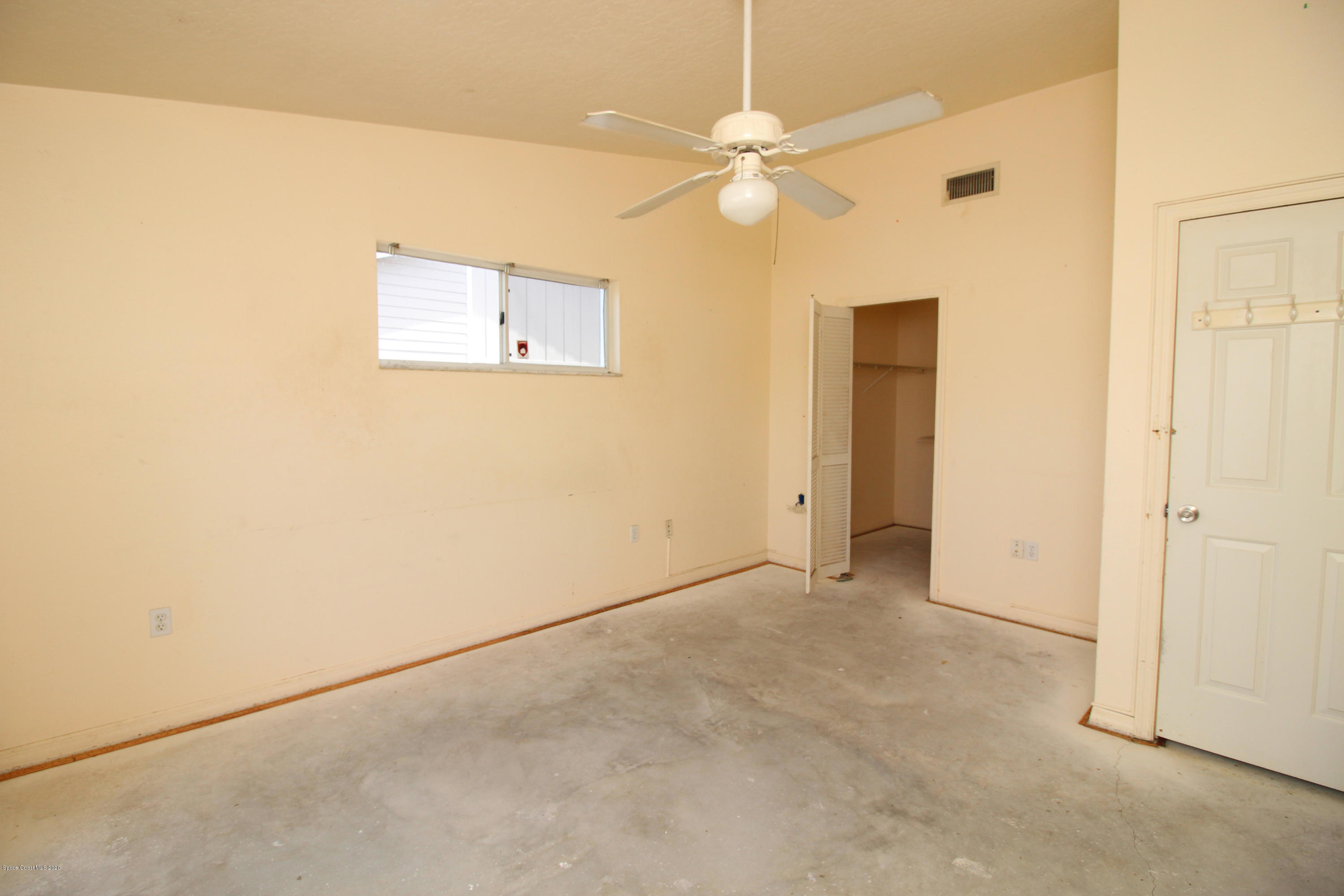 1940 Quail Ridge Court, Unit 402 Cocoa, FL 32926 - Photo 14 of 17 Quail Ridge Ct 1940 - 2nd bedroom - IMG_