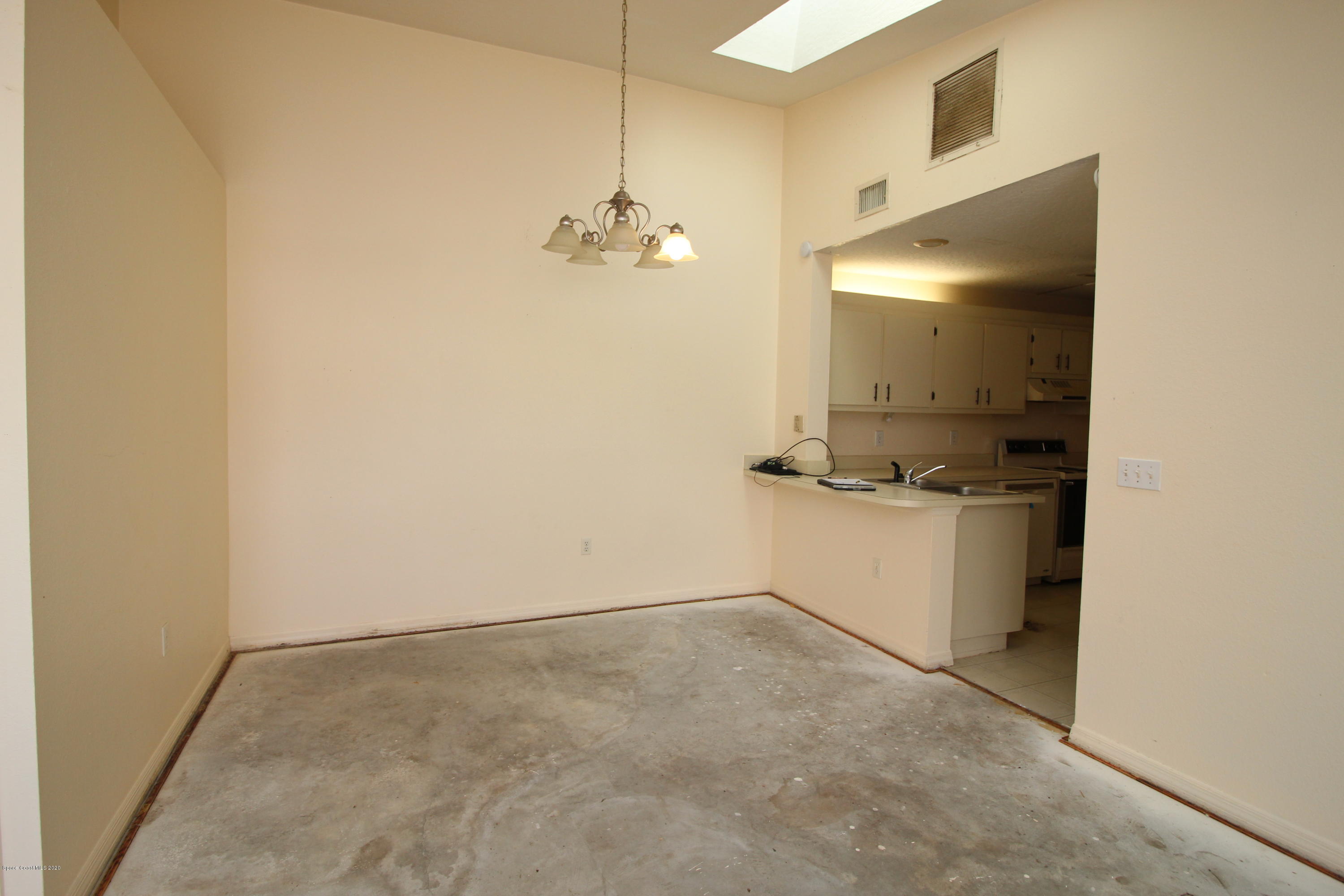 1940 Quail Ridge Court, Unit 402 Cocoa, FL 32926 - Photo 9 of 17 Quail Ridge Ct 1940 - dining - IMG_5814