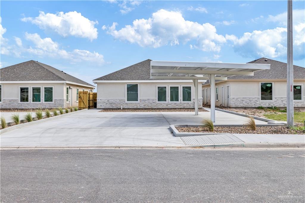 5322 Vision Street Rio Grande City, TX 78582 - Photo 1 of 20 a front view of a house with a entertaining space
