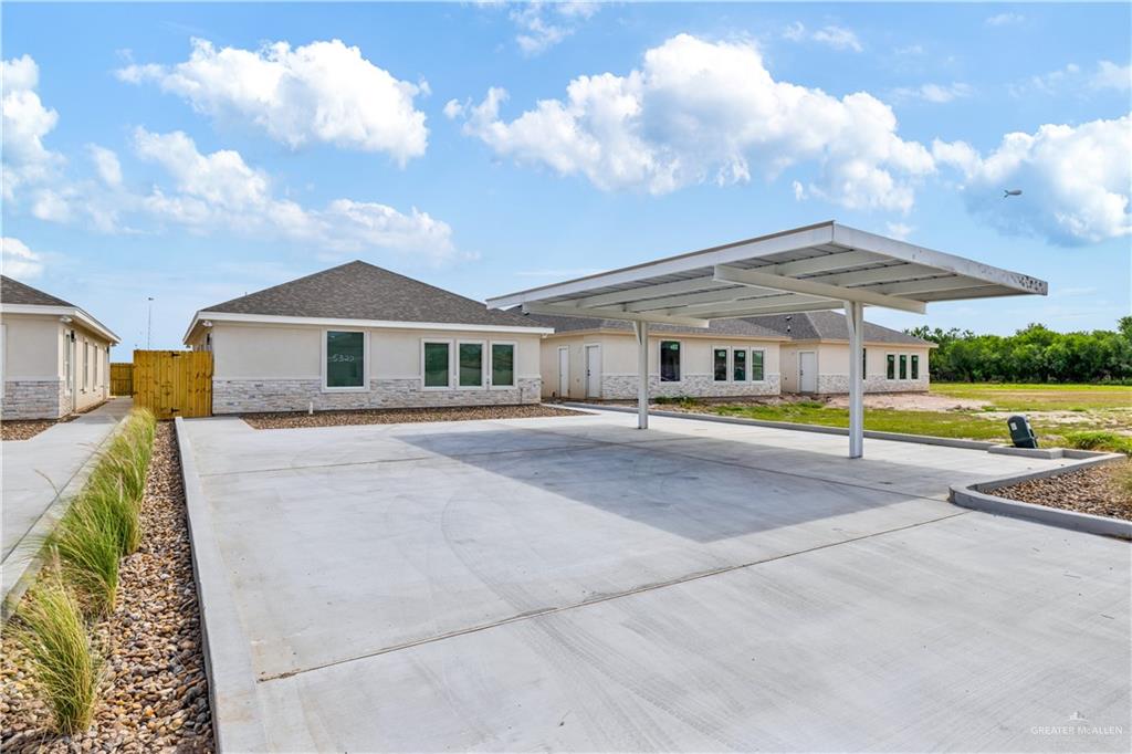 5322 Vision Street Rio Grande City, TX 78582 - Photo 2 of 20 a house with swimming pool in front of it