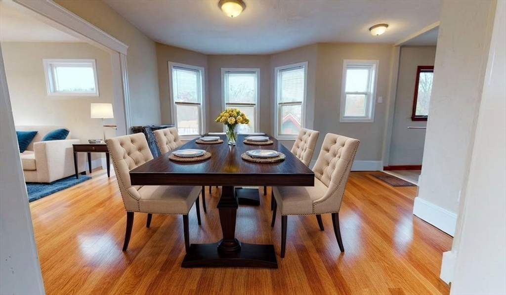 75 Cherry Street, Unit 2 Malden, MA 02148 - Photo 7 of 17 a view of a dining room with furniture and wooden floor