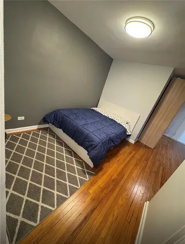 a view of workspace with wooden floor