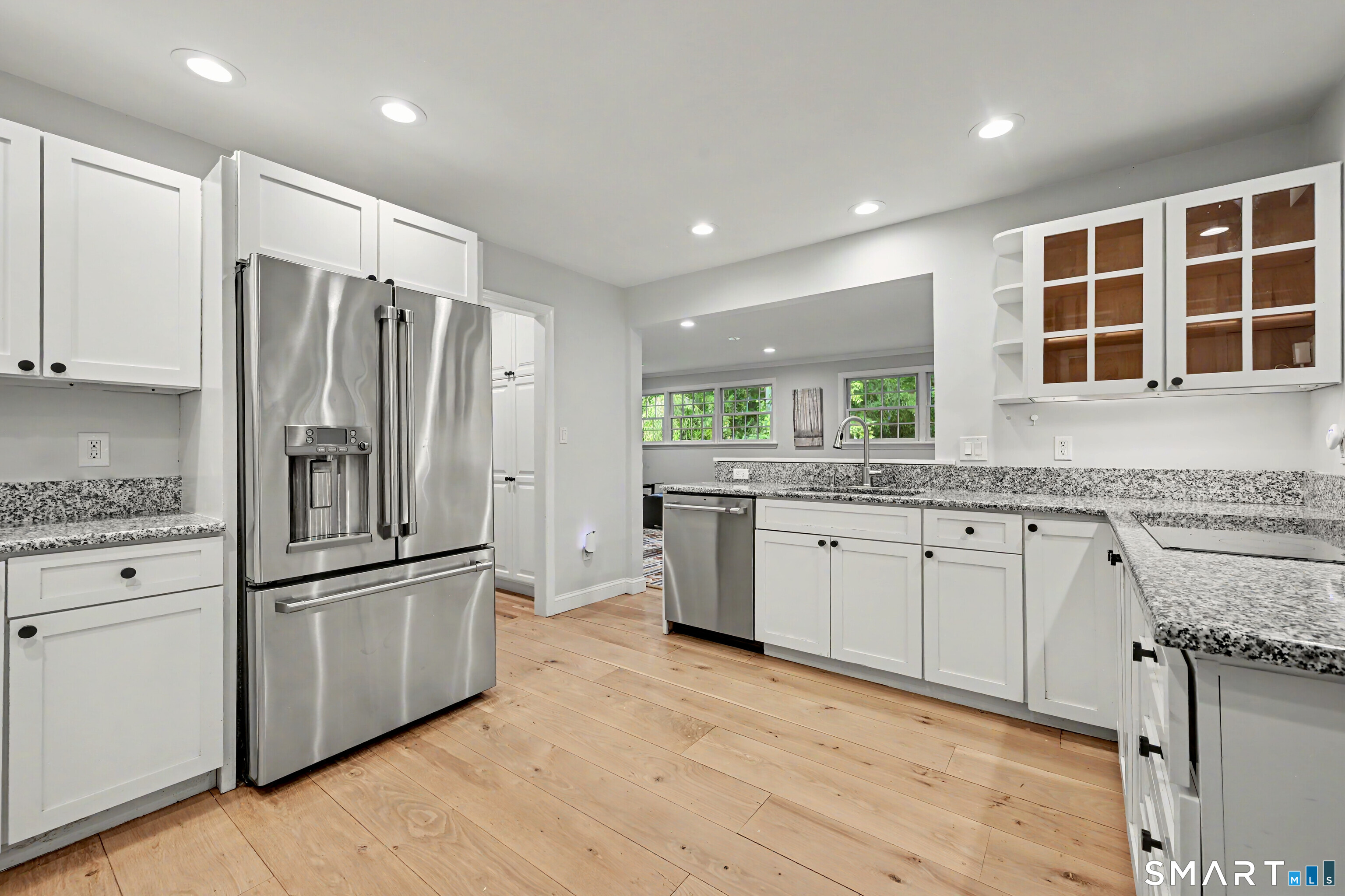 29 Orchard Hill Road Norwalk, CT 06851 - Photo 8 of 37 Kitchen to Family Room