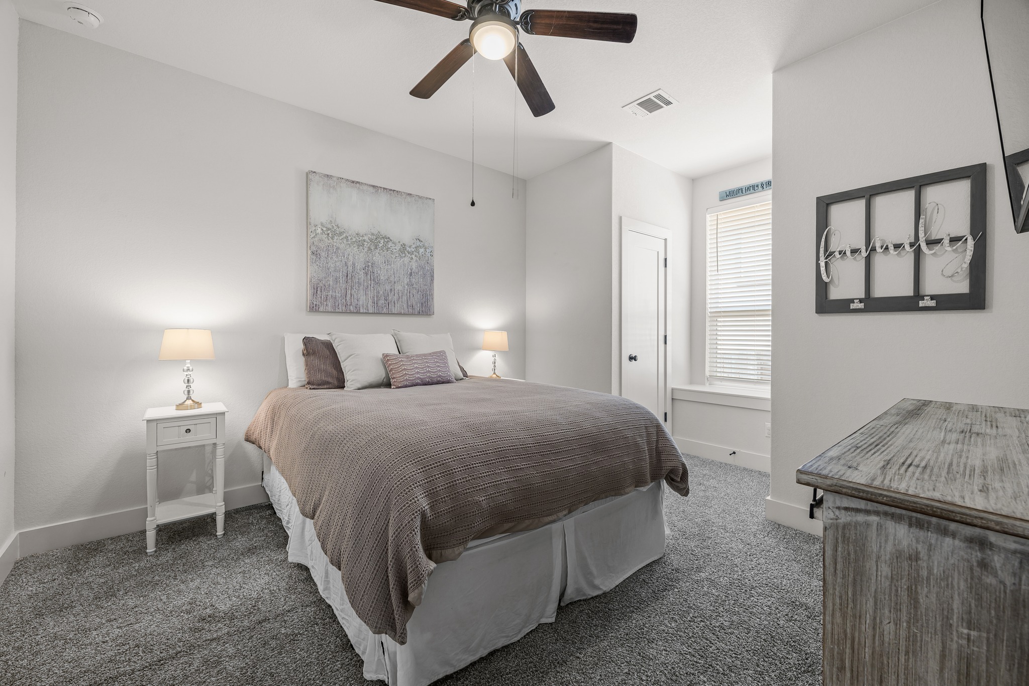 68 Rancho Trail Georgetown, TX 78628 - Photo 22 of 39 Well-lit and tranquil, this bedroom provides a peaceful retreat with plush carpet and essential comfort.