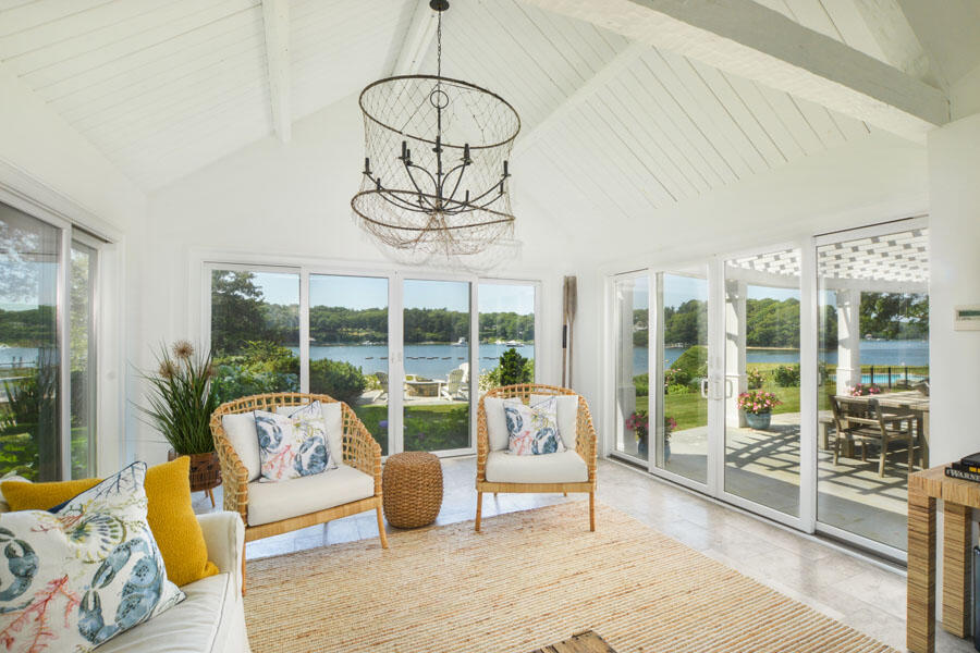 71 Sand Point Osterville, MA 02655 - Photo 17 of 45 a living room with furniture and a large window