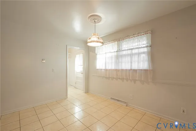 a view of an empty room with window