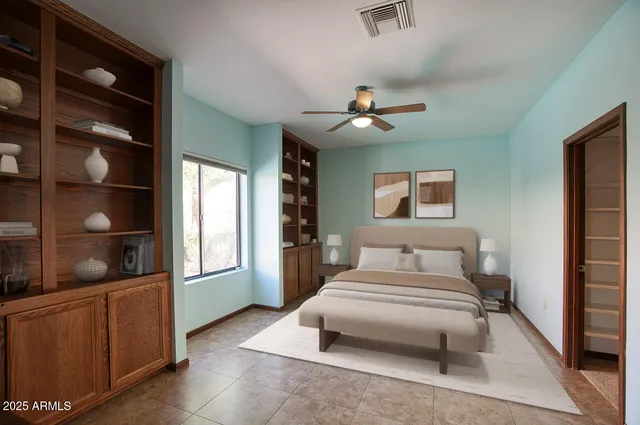 a kitchen with a sink cabinets and a wooden floor