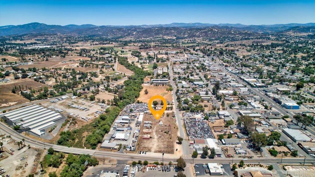 A Street Ramona, CA 92065 - Photo 10 of 13 an aerial view of residential house and sandy dunes