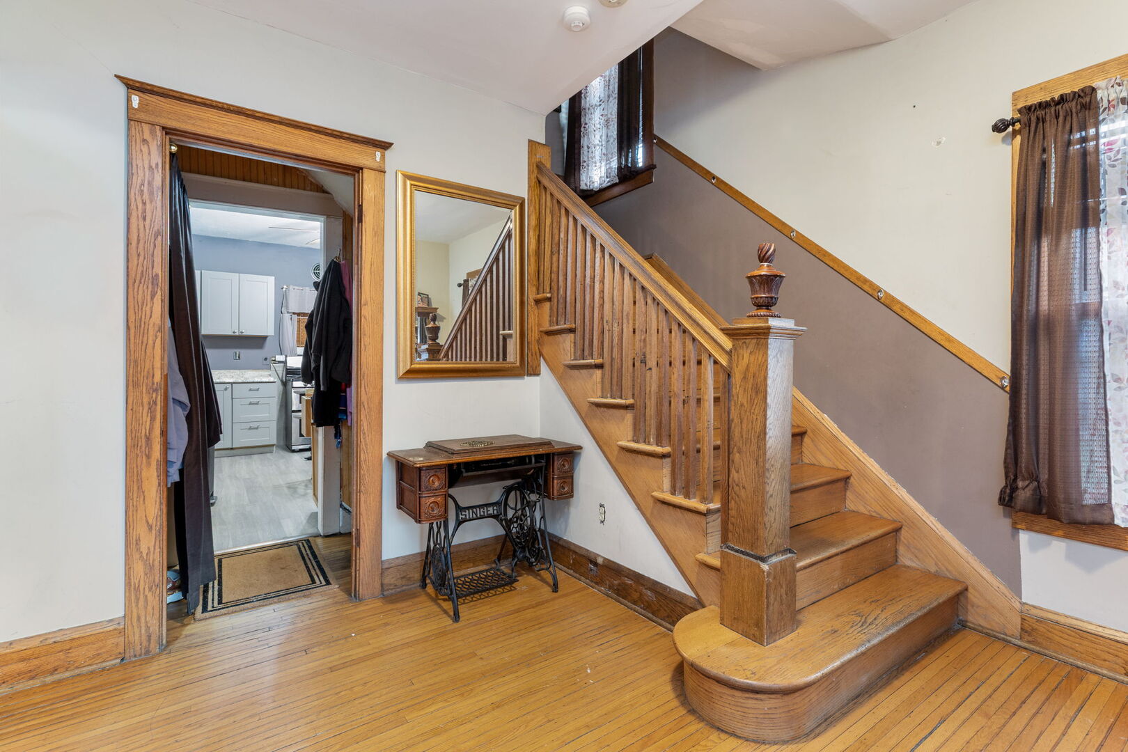610 Watson Street Aurora, IL 60505 - Photo 4 of 15 a view of entryway and hall with wooden floor
