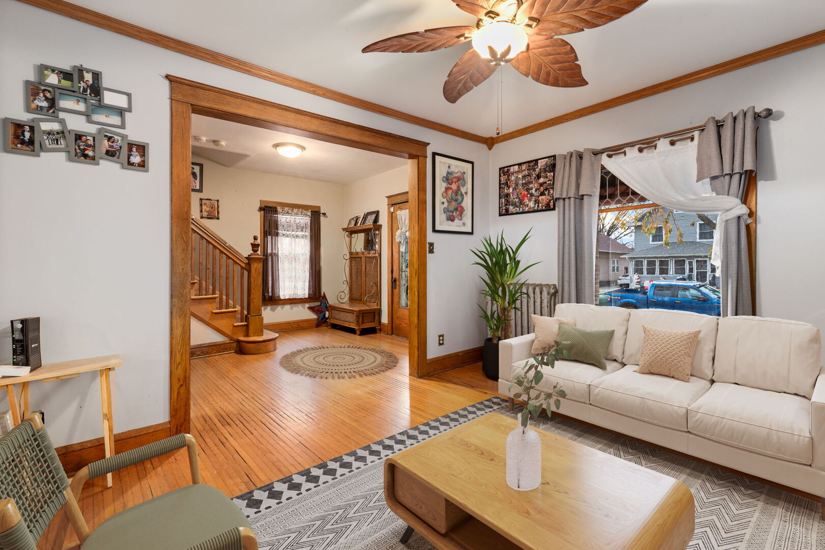 610 Watson Street Aurora, IL 60505 - Photo 6 of 15 a living room with furniture and a large window