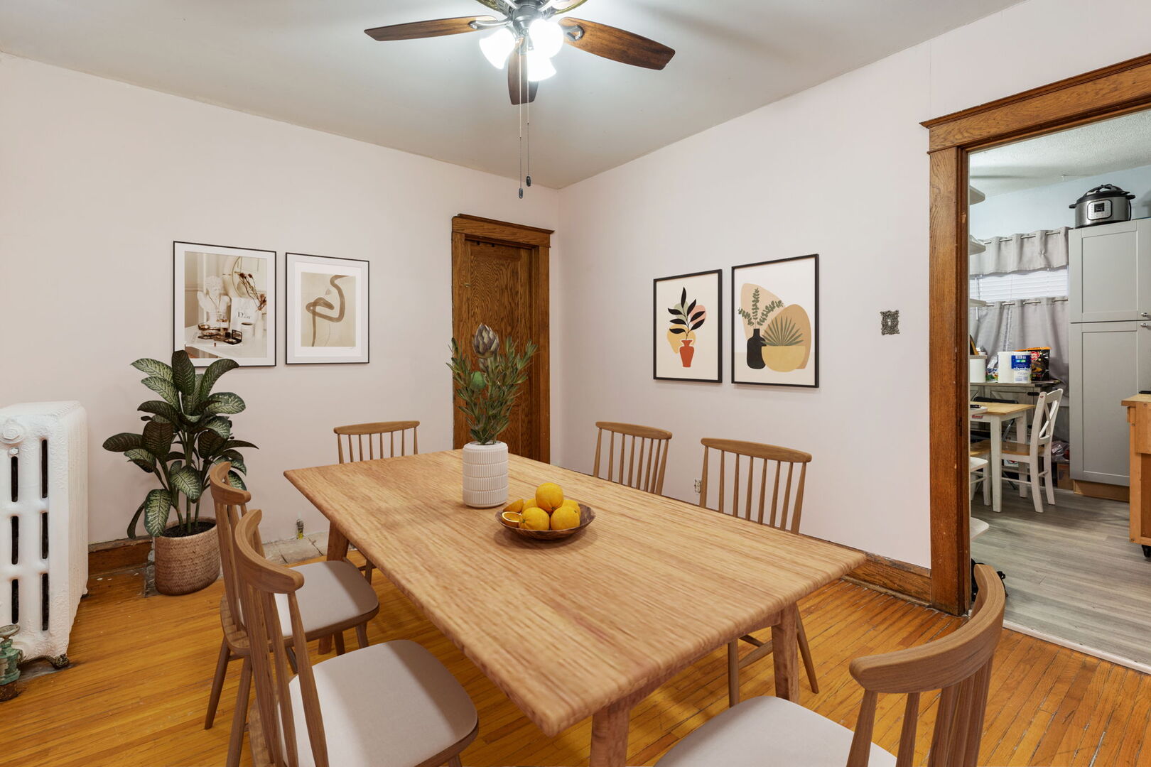 610 Watson Street Aurora, IL 60505 - Photo 8 of 15 a view of a dining room with furniture and wooden floor