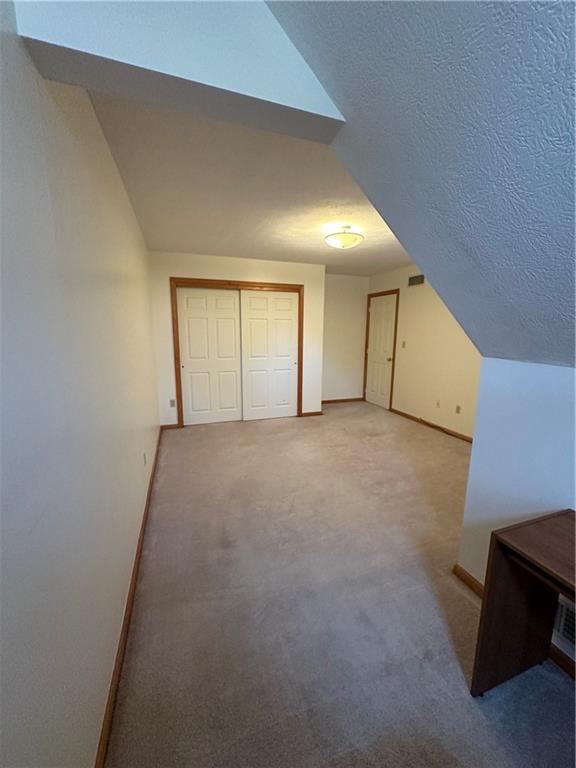131 Windy Drive Butler, PA 16001 - Photo 21 of 24 a view of a livingroom with an empty space and a window
