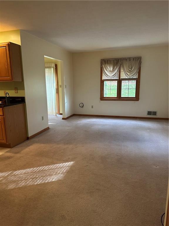 131 Windy Drive Butler, PA 16001 - Photo 10 of 24 a view of an empty room with a window