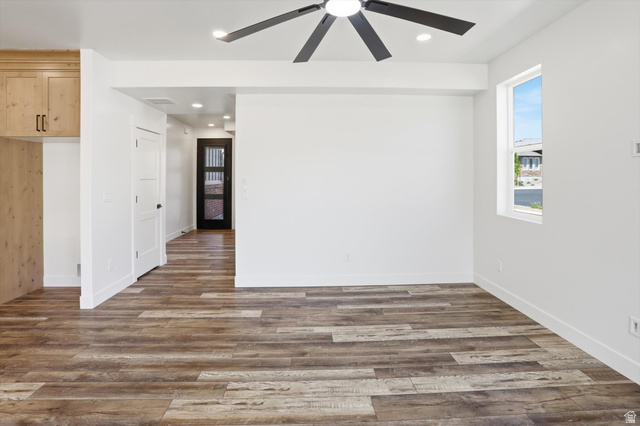 1315 West 3200 South, Unit 17 Perry, UT 84302 - Photo 8 of 58 Spacious interior featuring wood-finish plank flooring throughout