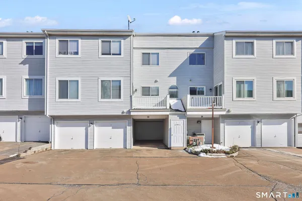 a front view of a house with yard