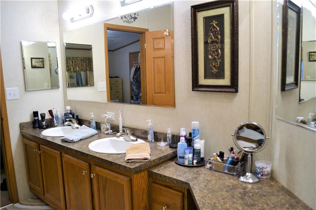 222 Toy Road Kittanning, PA 16201 - Photo 11 of 25 a bathroom with a sink and a mirror