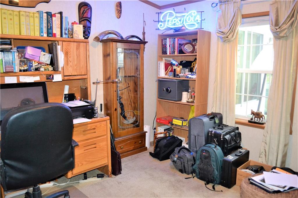 222 Toy Road Kittanning, PA 16201 - Photo 12 of 25 a room with furniture a rug toys and a window