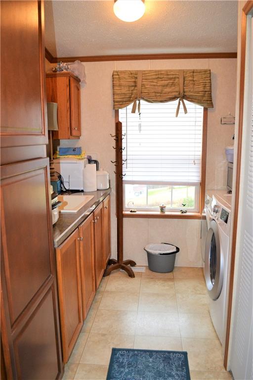 222 Toy Road Kittanning, PA 16201 - Photo 14 of 25 a bathroom with a sink a toilet and a bathtub