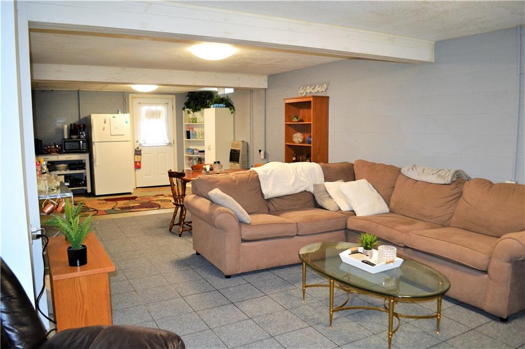 222 Toy Road Kittanning, PA 16201 - Photo 15 of 25 a living room with furniture and a wooden floor