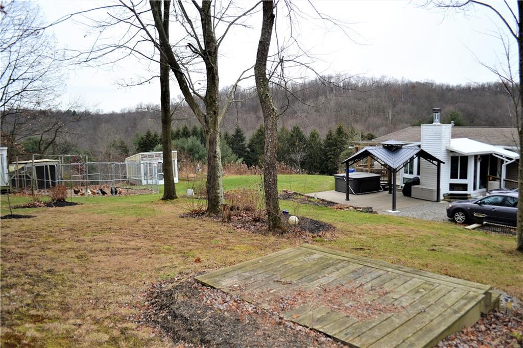 222 Toy Road Kittanning, PA 16201 - Photo 20 of 25 a view of a house with pool and sitting area