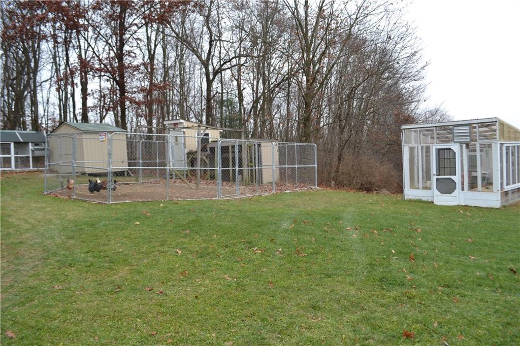 222 Toy Road Kittanning, PA 16201 - Photo 21 of 25 a view of a house with backyard and sitting area