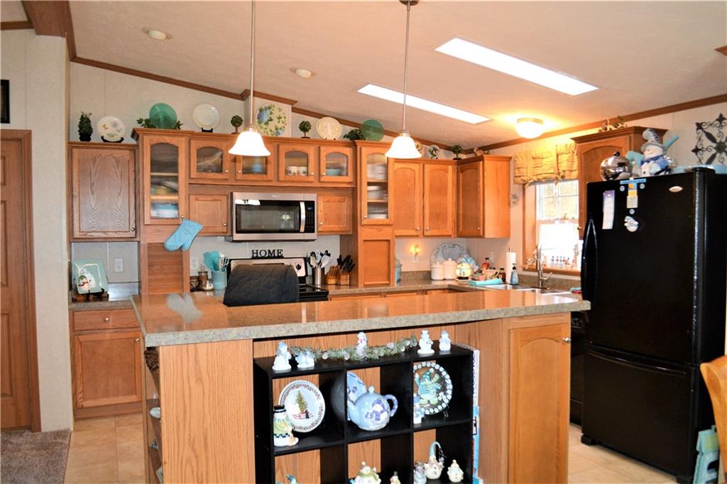 222 Toy Road Kittanning, PA 16201 - Photo 4 of 25 a kitchen with stainless steel appliances granite countertop a refrigerator and a stove