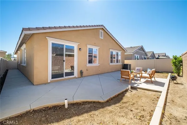a view of a house with a patio