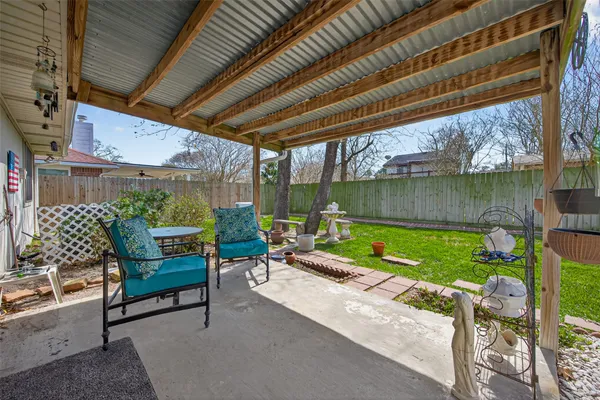 a garden view with a seating space