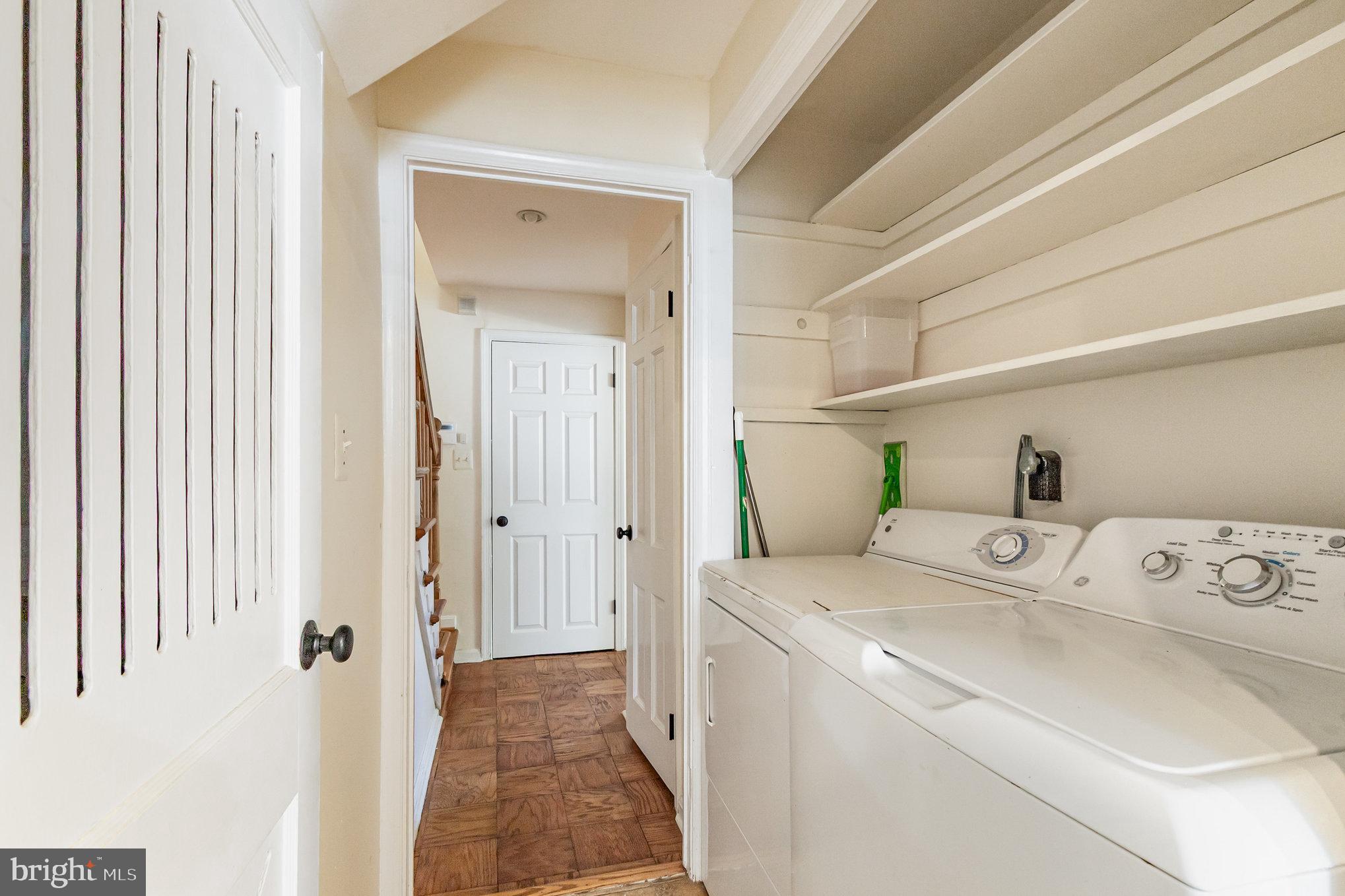 2304 Pickwick Road Baltimore, MD 21207 - Photo 14 of 37 a utility room with dryer and washer