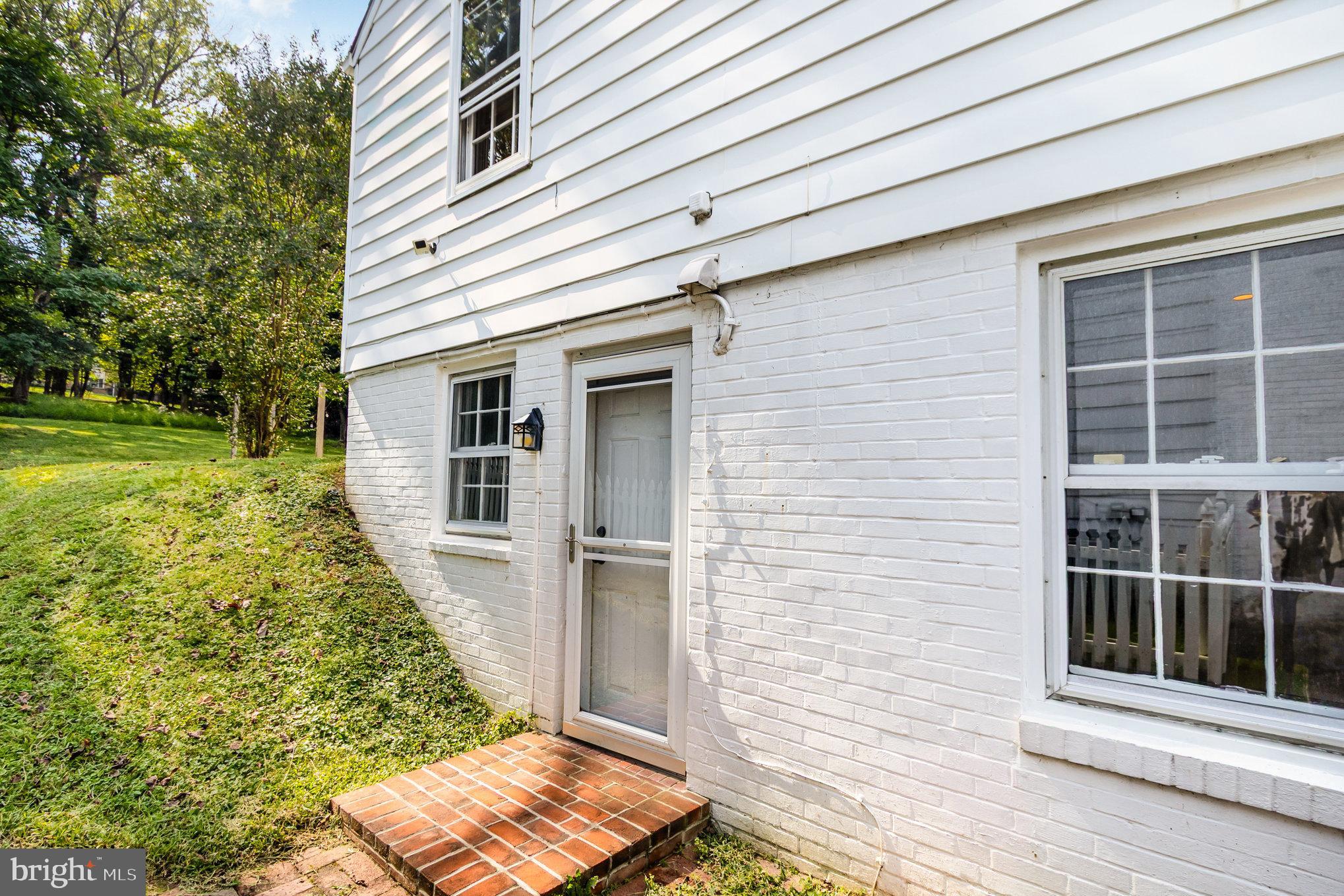 2304 Pickwick Road Baltimore, MD 21207 - Photo 28 of 37 a front view of a house with a yard