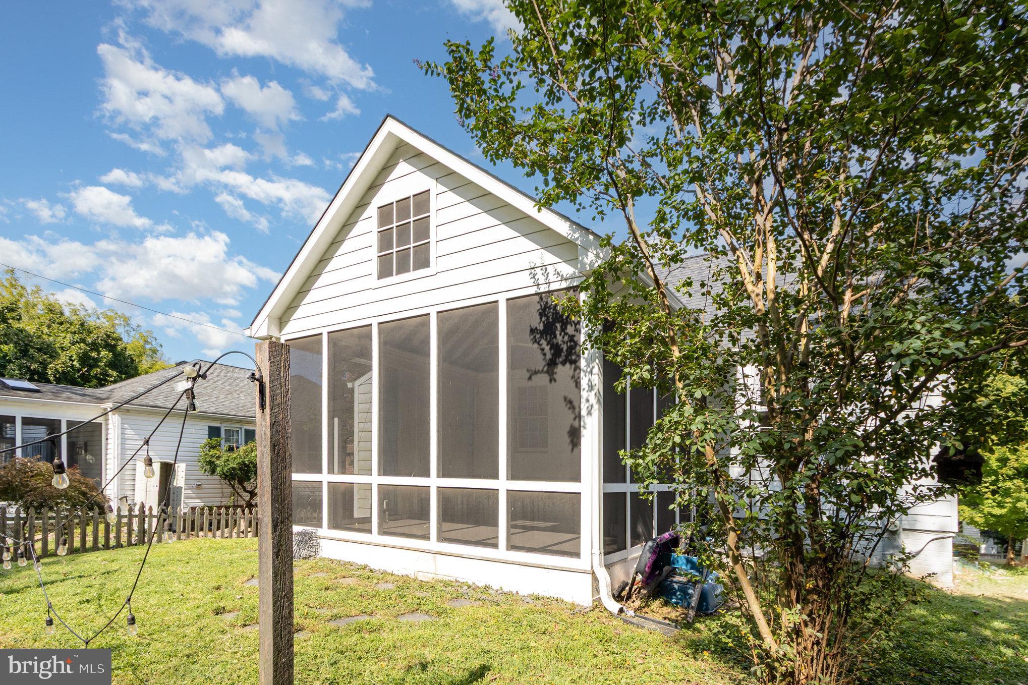 2304 Pickwick Road Baltimore, MD 21207 - Photo 30 of 37 a view of backyard with large trees and plants