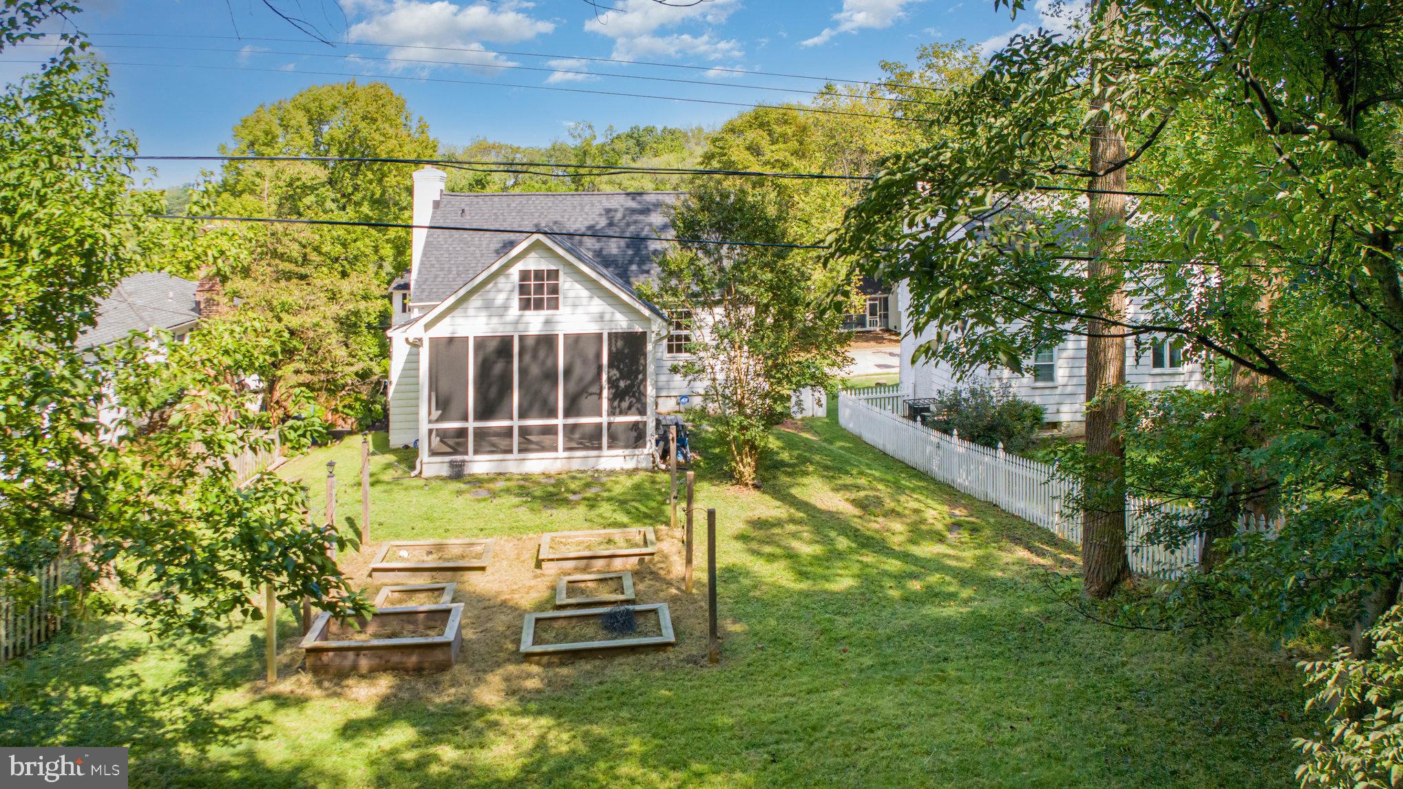 2304 Pickwick Road Baltimore, MD 21207 - Photo 34 of 37 a view of a chair and table in the garden