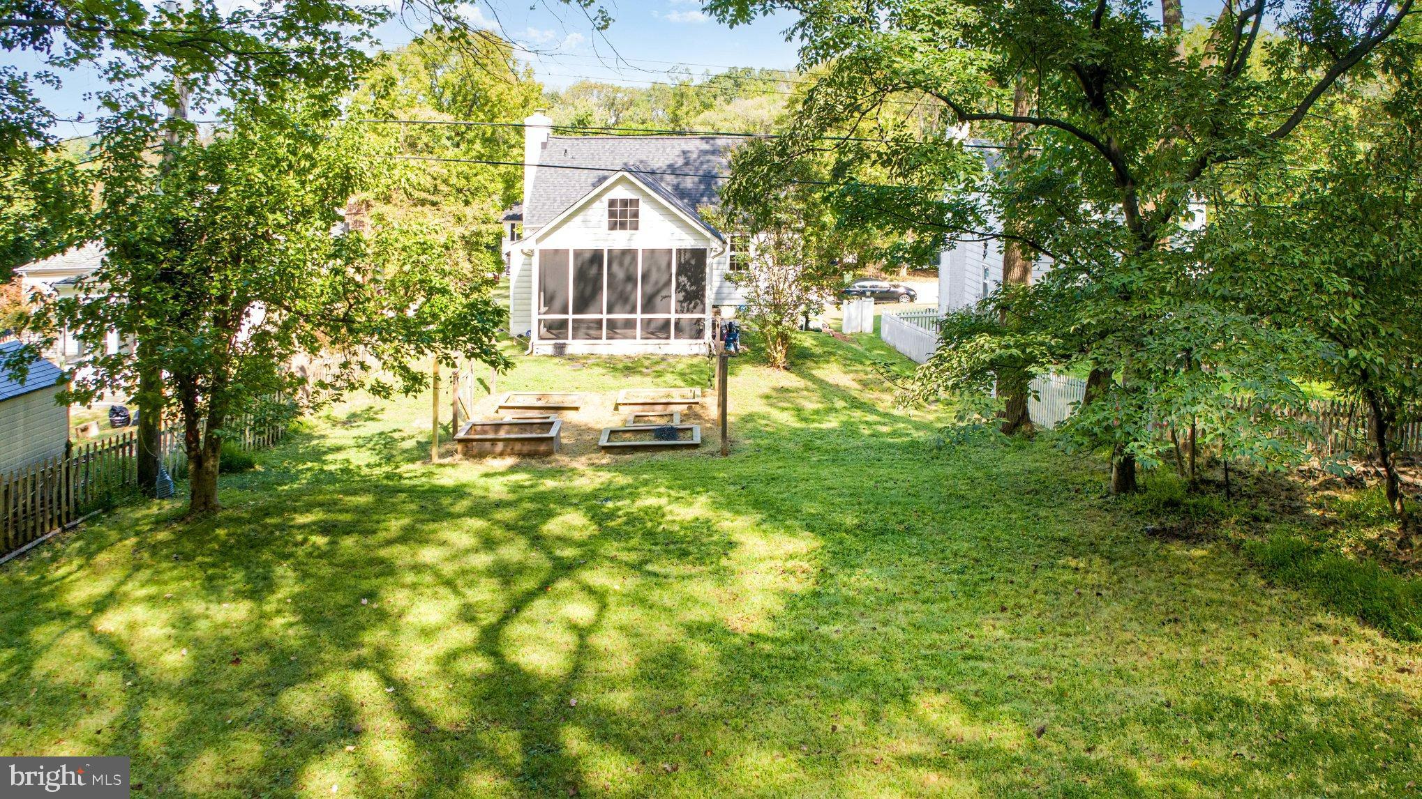 2304 Pickwick Road Baltimore, MD 21207 - Photo 35 of 37 a view of a house with a yard