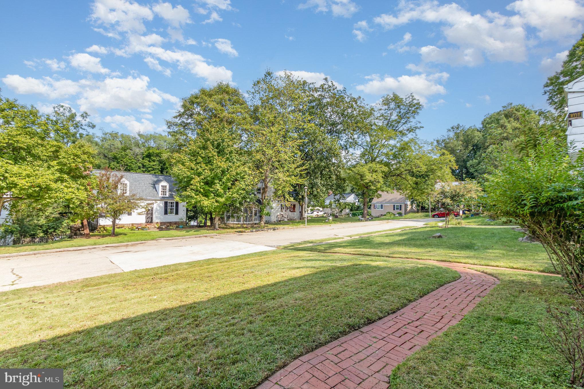 2304 Pickwick Road Baltimore, MD 21207 - Photo 6 of 37 a view of a swimming pool and a yard