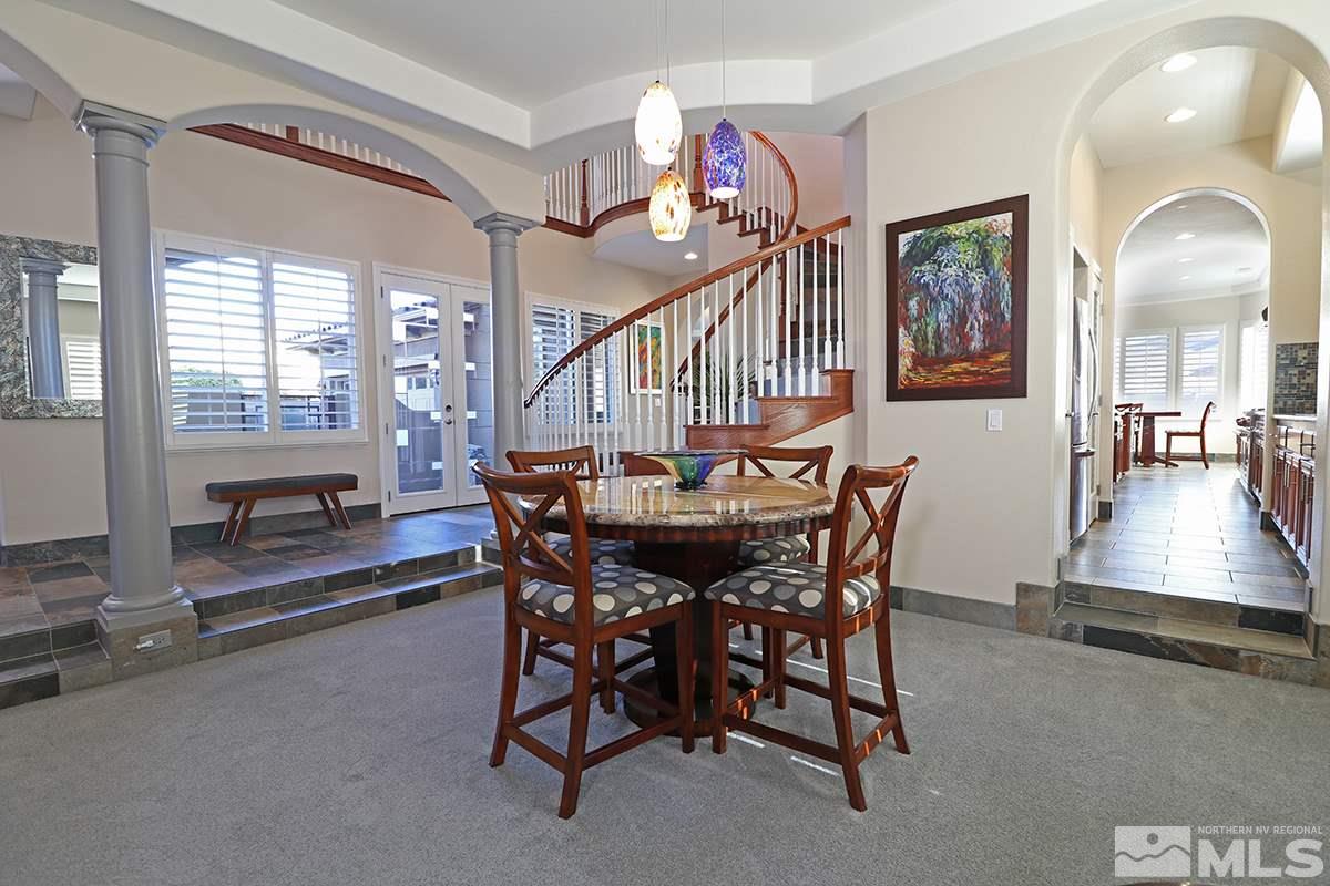 2655 Strathmore Court Reno, NV 89521 - Photo 15 of 38 a view of a a dining room with furniture window and wooden floor