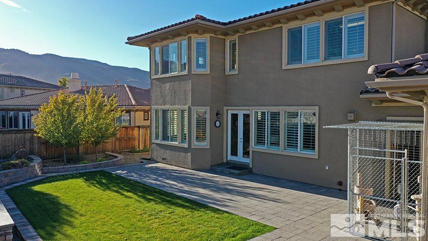 2655 Strathmore Court Reno, NV 89521 - Photo 31 of 38 a view of a house with a swimming pool and sitting area