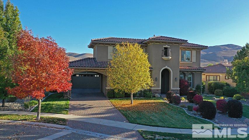 2655 Strathmore Court Reno, NV 89521 - Photo 34 of 38 a front view of a house with garden