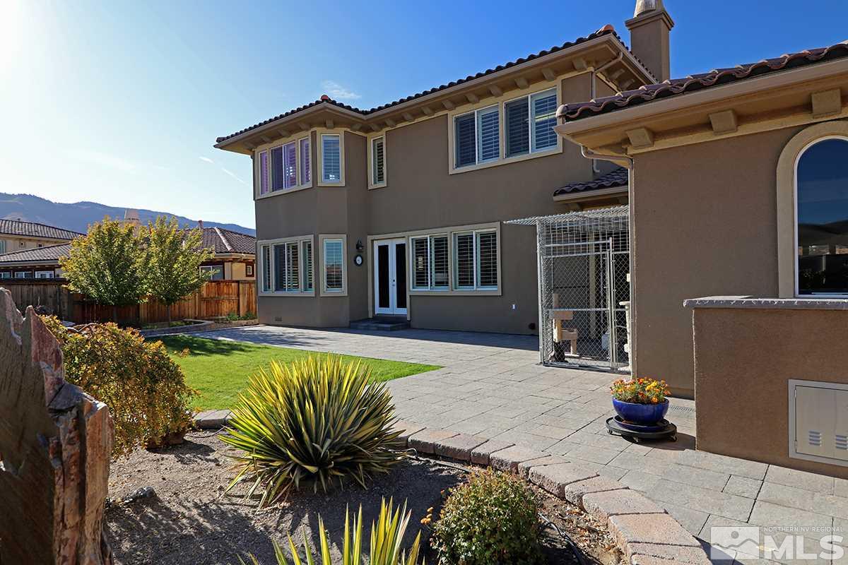 2655 Strathmore Court Reno, NV 89521 - Photo 35 of 38 a view of a house with swimming pool in front of it
