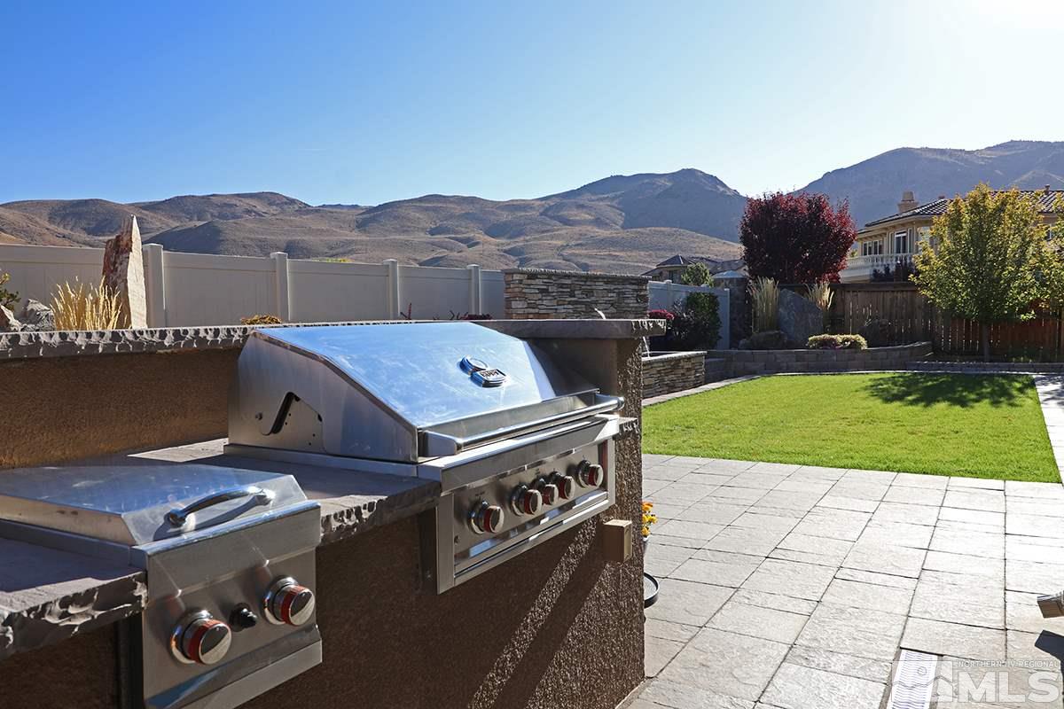 2655 Strathmore Court Reno, NV 89521 - Photo 37 of 38 a view of a terrace with a yard