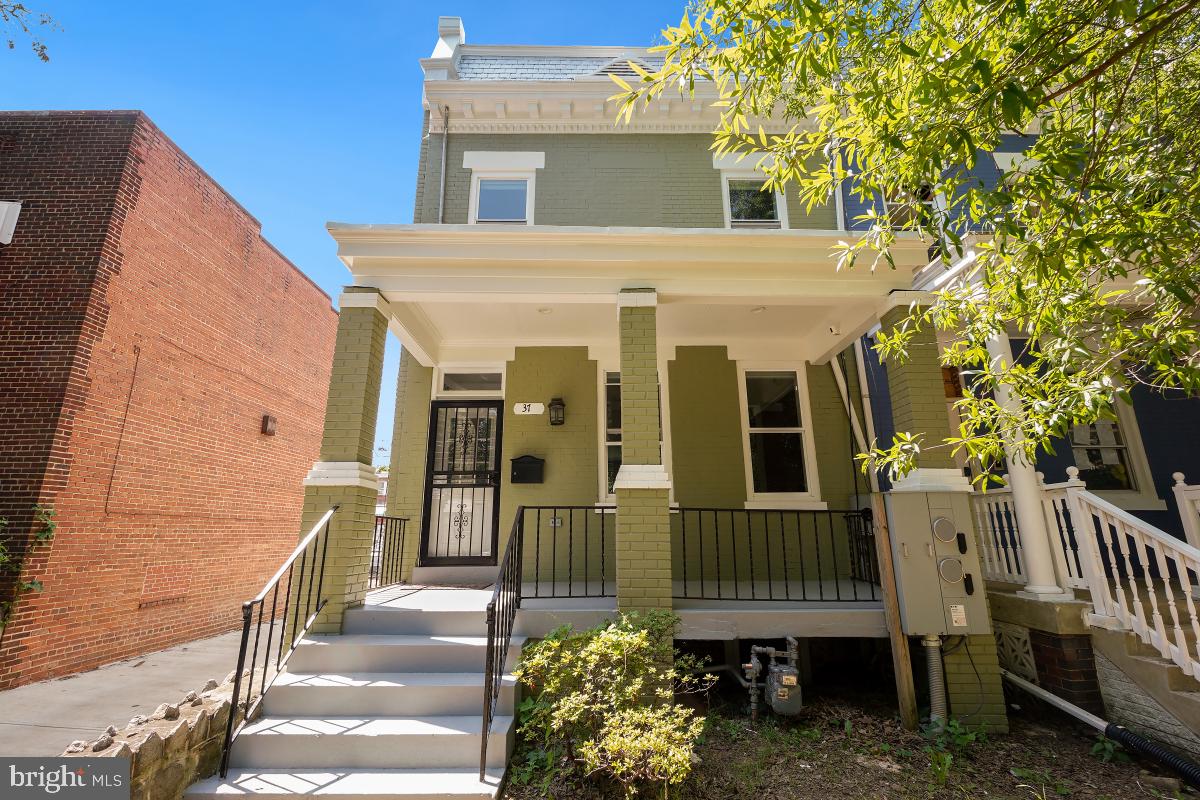 37 Michigan Avenue Northeast Washington, DC 20002 - Photo 2 of 31 a view of a house with a yard