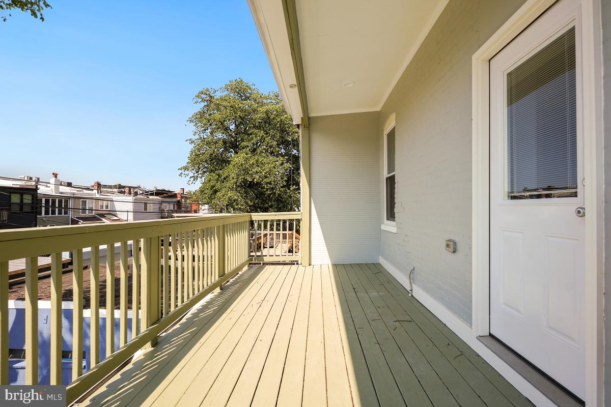 37 Michigan Avenue Northeast Washington, DC 20002 - Photo 23 of 31 a view of a balcony with wooden floor