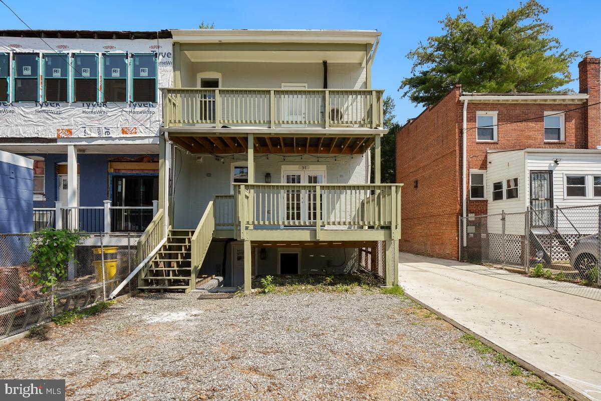 37 Michigan Avenue Northeast Washington, DC 20002 - Photo 30 of 31 a front view of a house with a deck