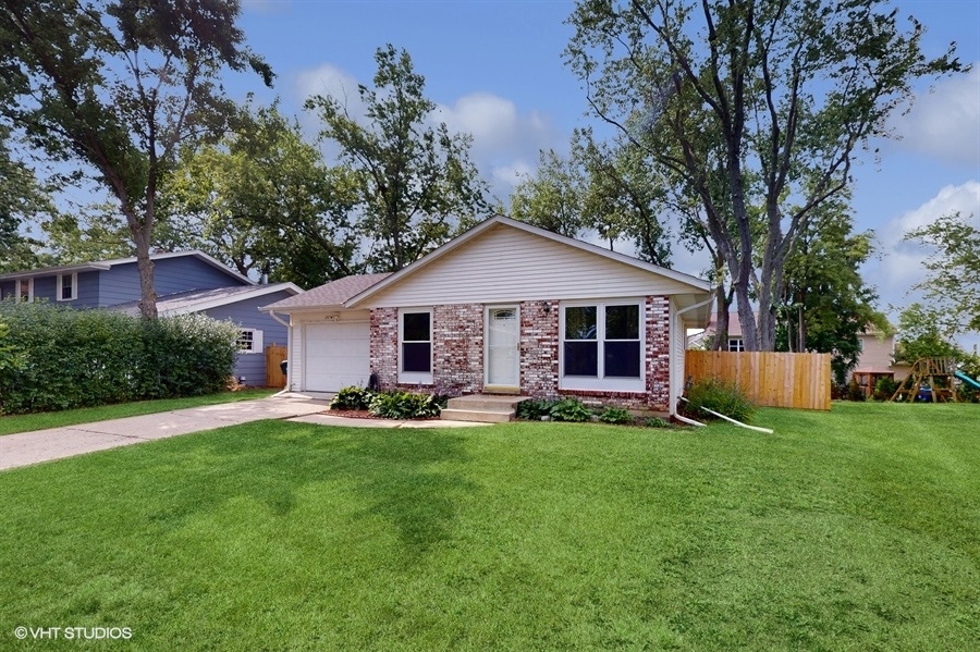 2321 Spring Hill Lane Lindenhurst, IL 60046 - Photo 1 of 30 a view of a house with a yard and sitting area