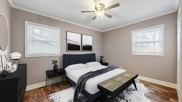 2321 Spring Hill Lane Lindenhurst, IL 60046 - Photo 12 of 30 a bedroom with a bed table and chair