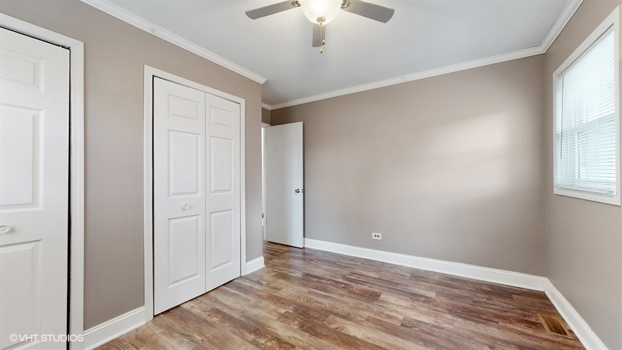 2321 Spring Hill Lane Lindenhurst, IL 60046 - Photo 14 of 30 wooden floor in an empty room with a window