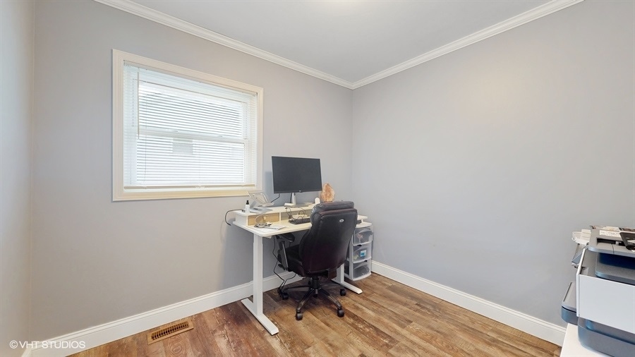 2321 Spring Hill Lane Lindenhurst, IL 60046 - Photo 17 of 30 a workspace with furniture and a window