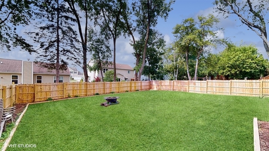 2321 Spring Hill Lane Lindenhurst, IL 60046 - Photo 29 of 30 a view of yard with swimming pool